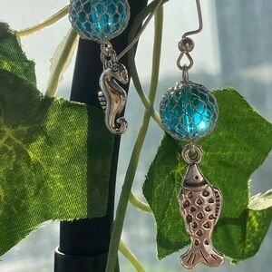 Fish charm earrings